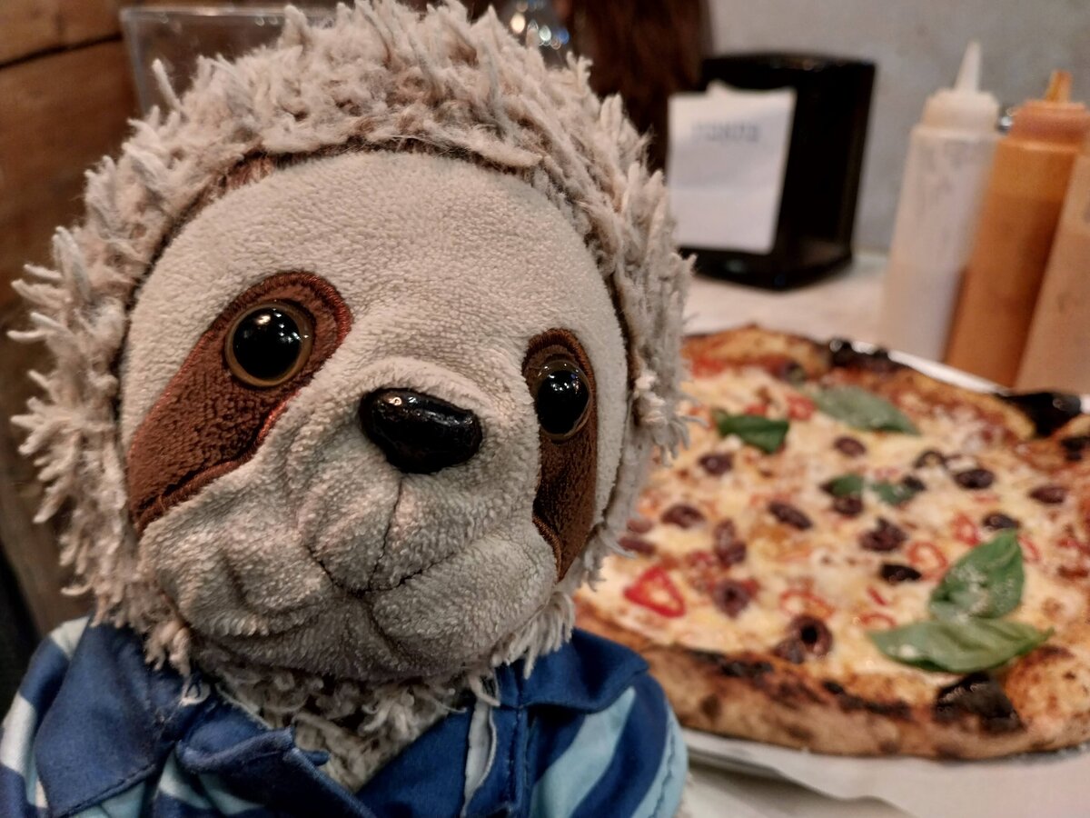 Corn enjoying pizza